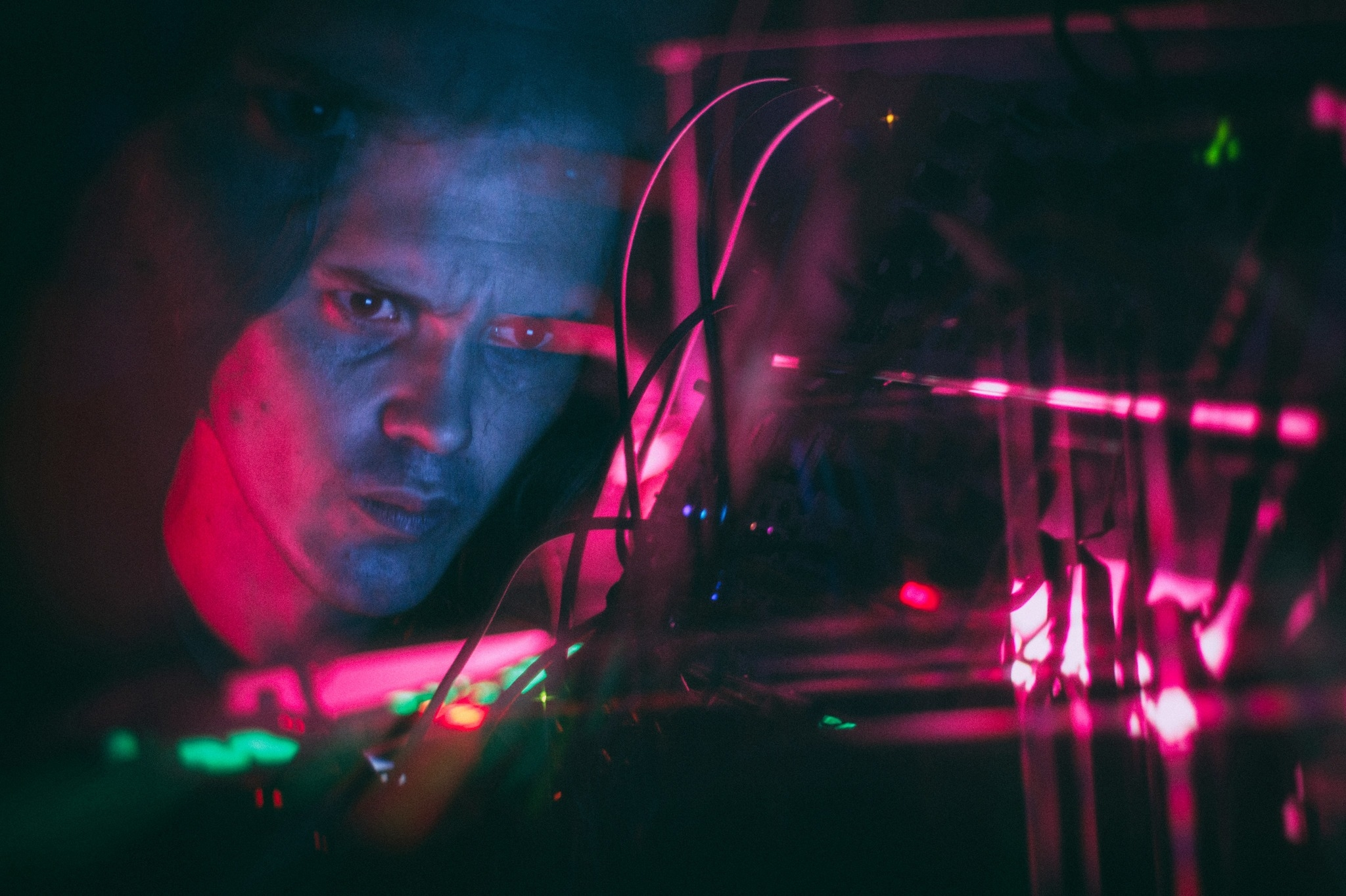 Juan Esteban Gartner capturing his expression and surroundings in a softly lit environment.